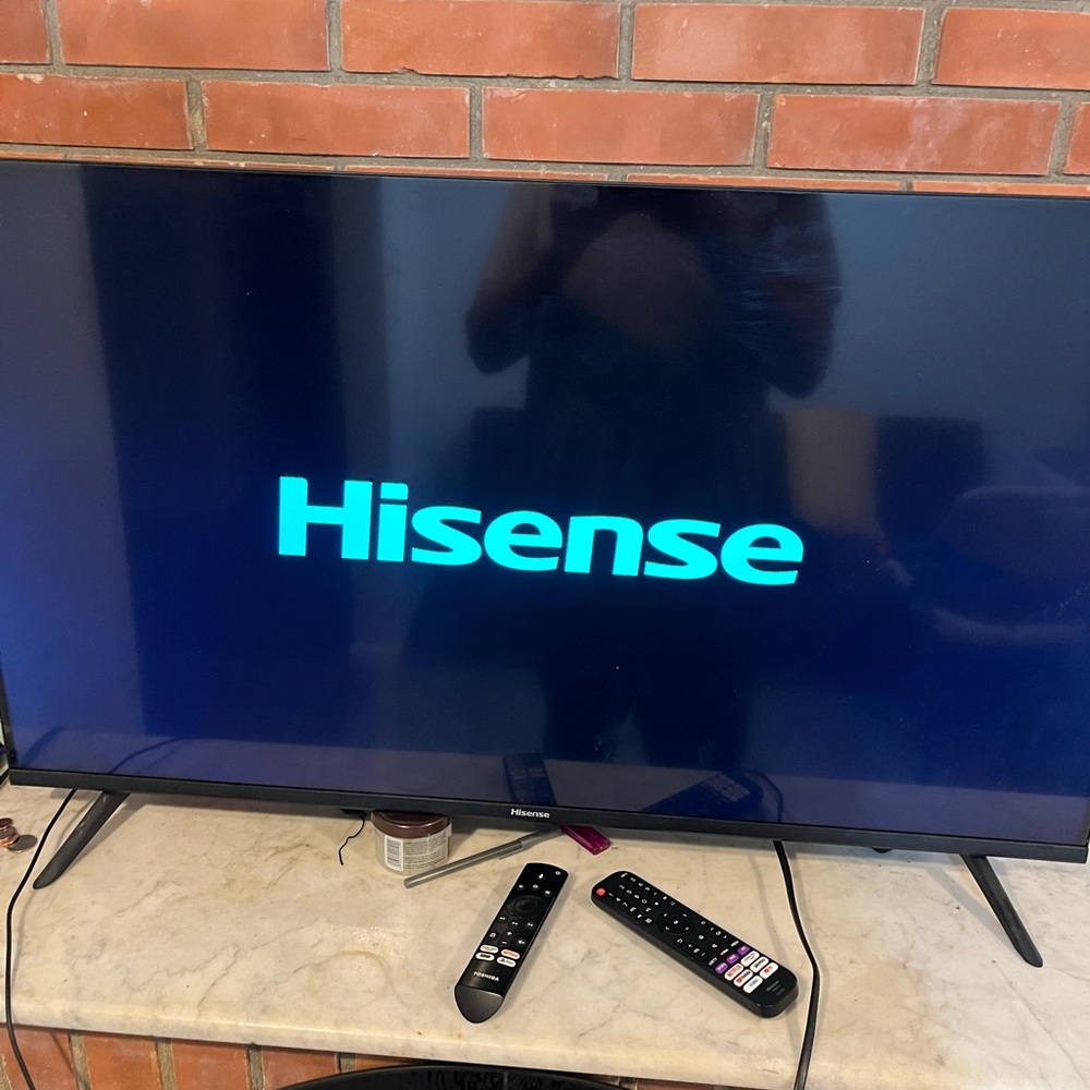 Hisense Flat Screen TV with Remote Controls